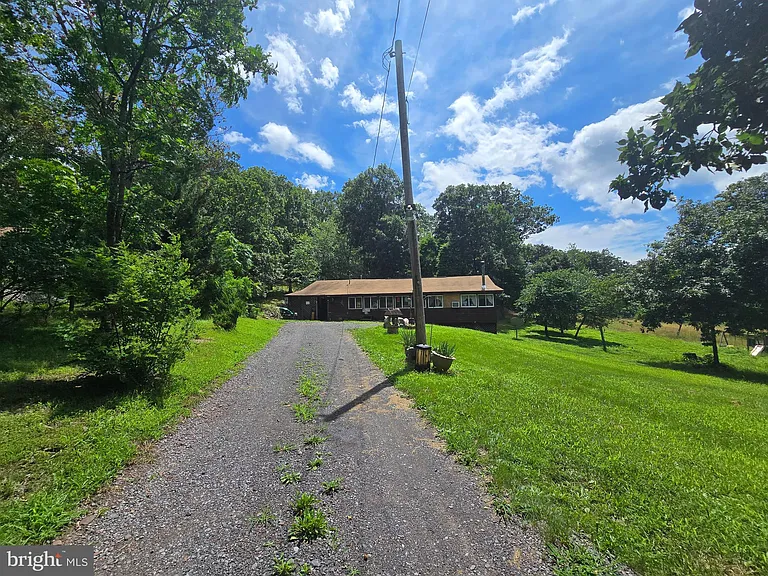 Welcome to 57 Ember Lane, tucked away in the scenic lake community of Sleepy Hollow. $199,000