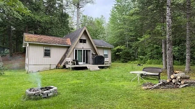 Rustic A-Frame Retreat on 2.8 Acres Along Stony Brook