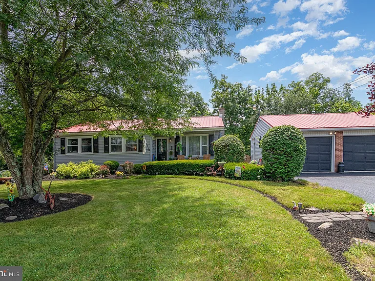 Situated on a spacious 0.34-acre lot, this well-maintained home offers the perfect blend of comfort,