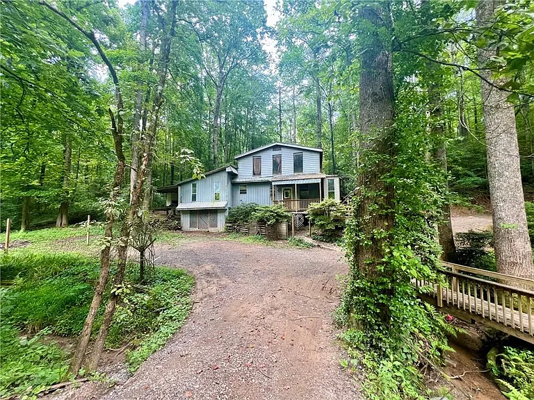 Transform this property into something special. Convenient to beautiful Ellijay and located on 1.92 spacious acres. $159,900