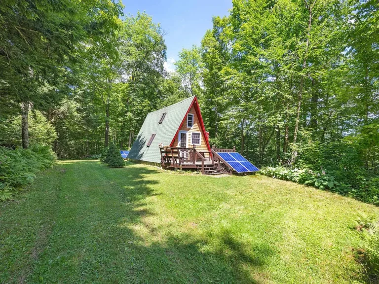 Off-Grid A-Frame Retreat in the White Mountains – Private, Upgraded & Full of Charm! $165,000