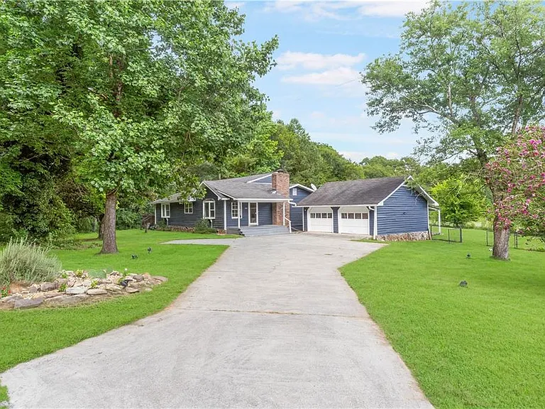 Discover the charm and character of this beautifully maintained 4-bedroom, 2-bath farmhouse nestled $295,000