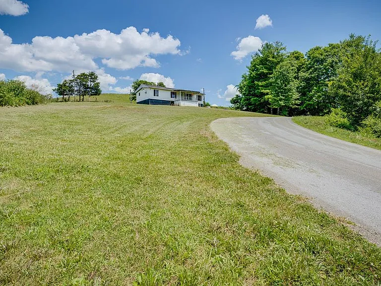 Great Potential Doublewide Home on Half Acre Near Schools and Scenic Oxbow Lake Park