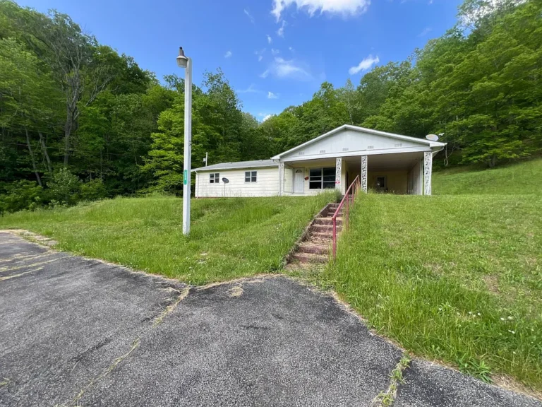 27.4± Acres with Utilities, Outbuildings & Renovation Opportunity – Near I-79 & Elk River