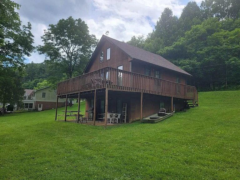 Discover a rare chance to own a riverfront rustic cabin on the peaceful West Fork of the Little River in scenic Floyd County, VA.