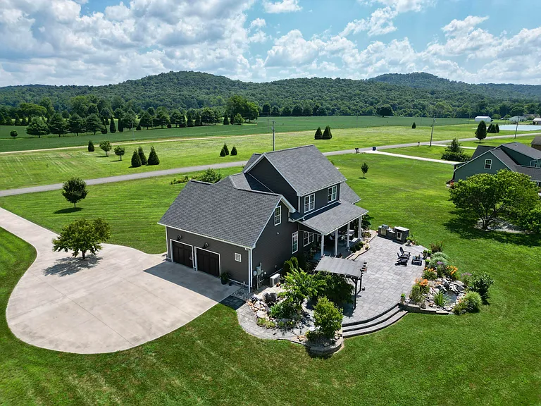 A MUST SEE ‘one of a kind’ 2-acre oasis sitting on Pitman Creek.