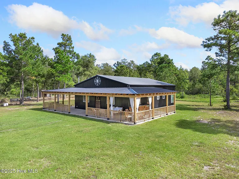 Private 48+ Acre Outdoor Sanctuary with Custom Home, Pond, Workshop & Endless Possibilities!