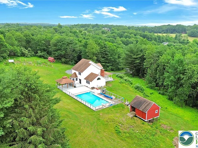 Private Country Oasis on 12 Acres – Colonial Home with Pool, Barn, and Endless Charm