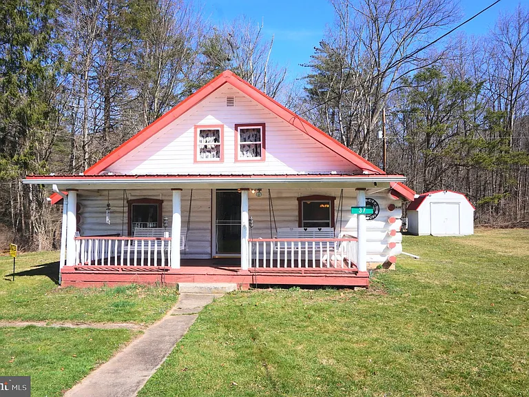 This Picturesque Log Cabin would make the perfect vacation getaway or could be lived in year round.  $109,999