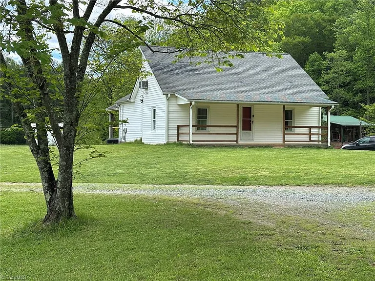 Nestled 0n 21.12 picturesque acres along the beautiful Fisher River, $379,000