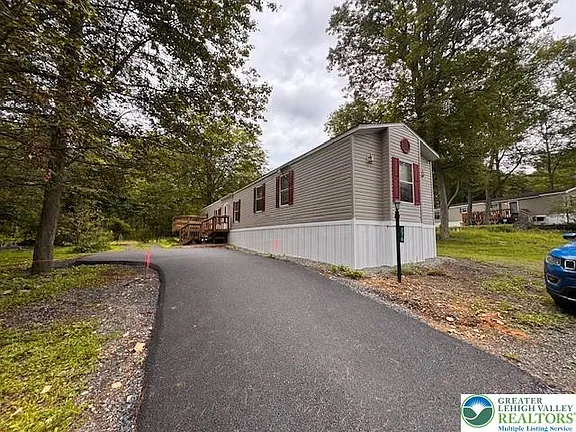 2 Bed | 2 Bath | 1,064 Sq Ft | Private Wooded Lot $89,900
