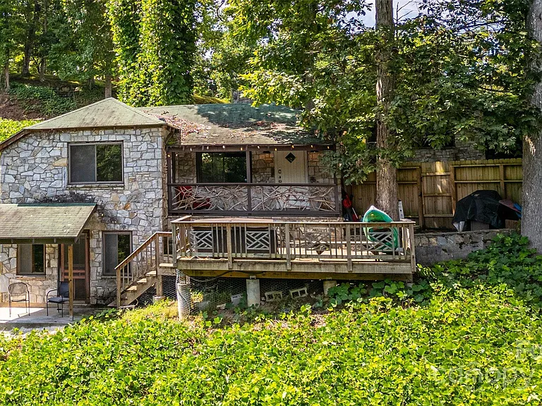 Step back in time with this charming 2-bedroom, 1-bath historic cottage at the Nantahala Village Resort.  $275,000