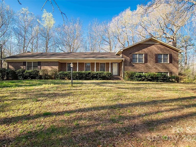 Spacious Tri-Level All-Brick Home on 23.62 Acres: A Private Retreat with Endless Potential