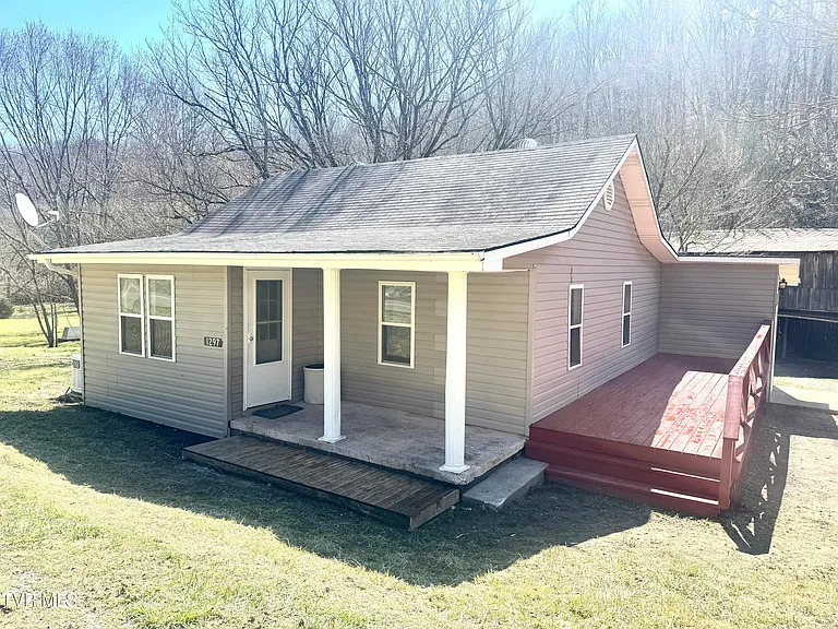 Country Hunting Retreat with Multiple Buildings and 50+ Acres – Power Backup Included!
