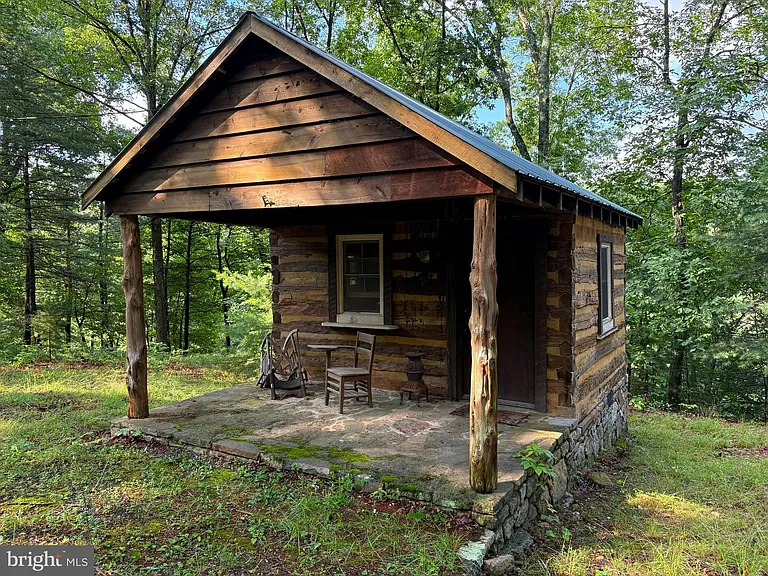 Tucked Beneath the Oaks Along the North River – A Rare Ice Mountain Retreat. $68,900
