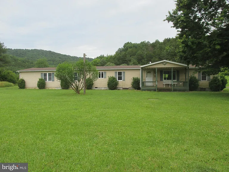 UNBELIEVABLE PANORAMIC MOUNTAIN VIEWS AND A PRIVATE SECLUDED PRISTINE SETTING IS WHAT YOU’LL FIND WHEN YOU TOUR THIS HOME ON OVER 13 ACRES. $249,900
