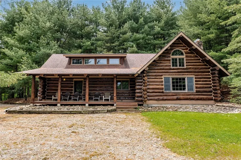 Handcrafted Log Home on 37 Acres with Private Lake, Trails & Rustic Elegance