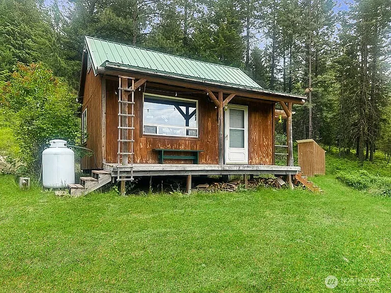 Rustic Riverside retreat on 20.2 acres around the bend from National Forest Land, Crawfish Lake & Snow Park! $130,000
