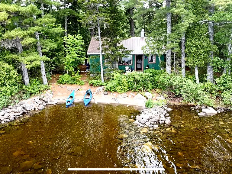 “Katahdin’s Crown Jewel: Private Island Retreat on Millinocket Lake”