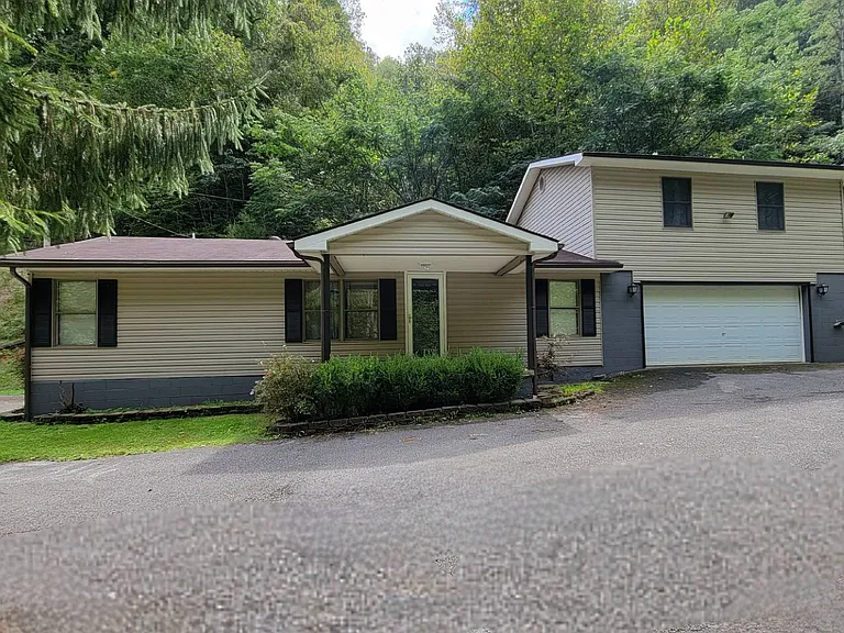 This beautiful home sits on approximately 31 acres of land at the end of a quiet country road. $195,000