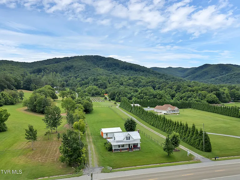 Charming farmhouse on 1 acre with stunning mountain views! Enjoy a spacious, $129,900