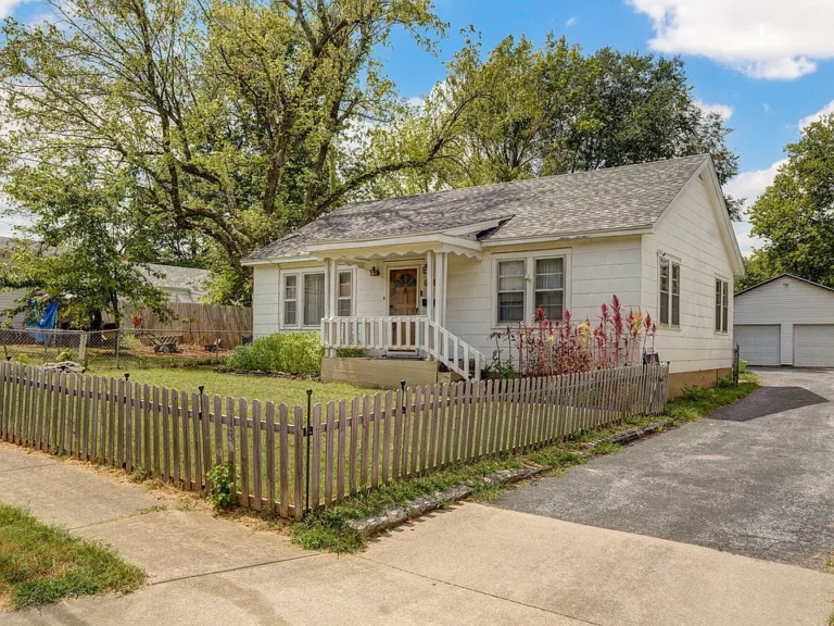 Spacious 4-Bedroom Bungalow with Garage/Shop & Updates $189,900