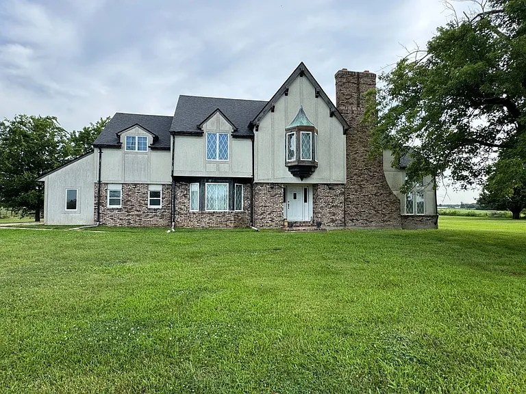 Spacious Country Home on 10 Acres with Barns