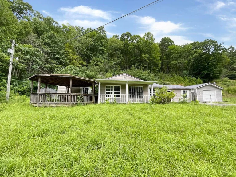 Spacious 4BR/3BA Country Home with Detached Garage & Guest Suite – Bring Your Vision!  $62,500