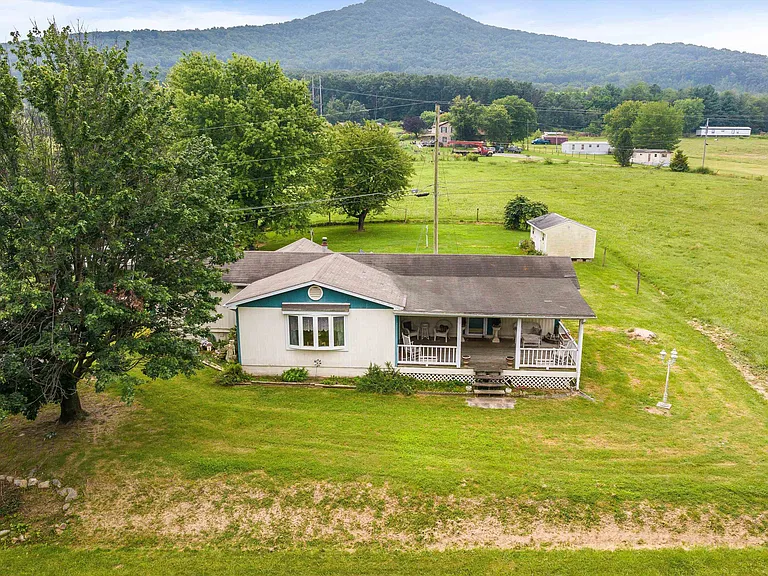 Gorgeous Pasture setting and Mountain Backdrop awaits at this 4.2 acre paradise! $179,900