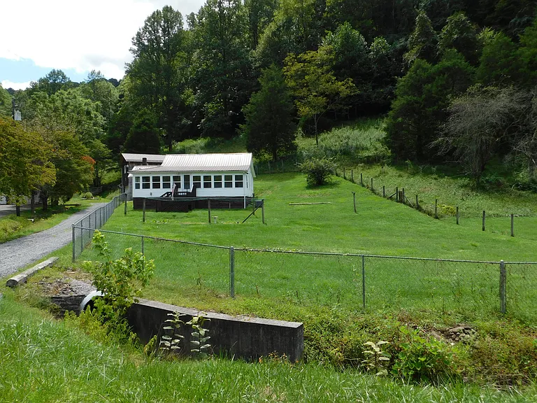 This farm house sets in a beautiful setting on just over 7 acres of land! $94,900