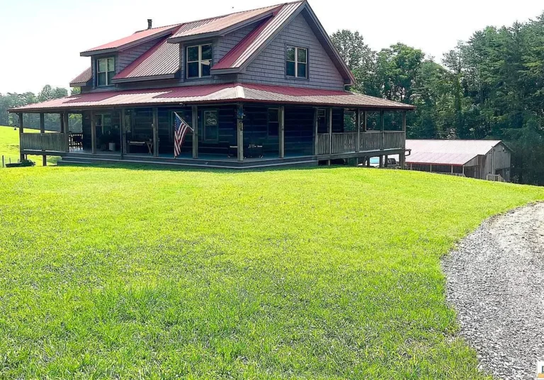 Very Motivated Seller! Absolutely Breathtaking Log Home on 63 Unrestricted Acres in Adair County