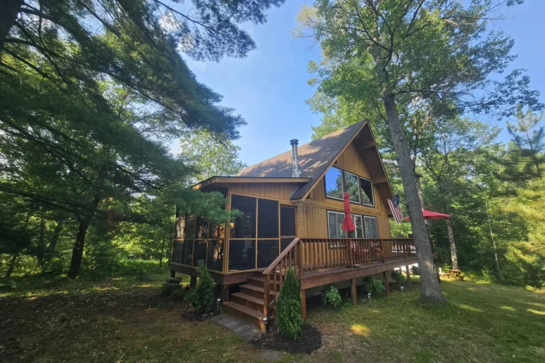 Discover your Northwoods escape at this enchanting Cedar Chalet, nestled among the pines.