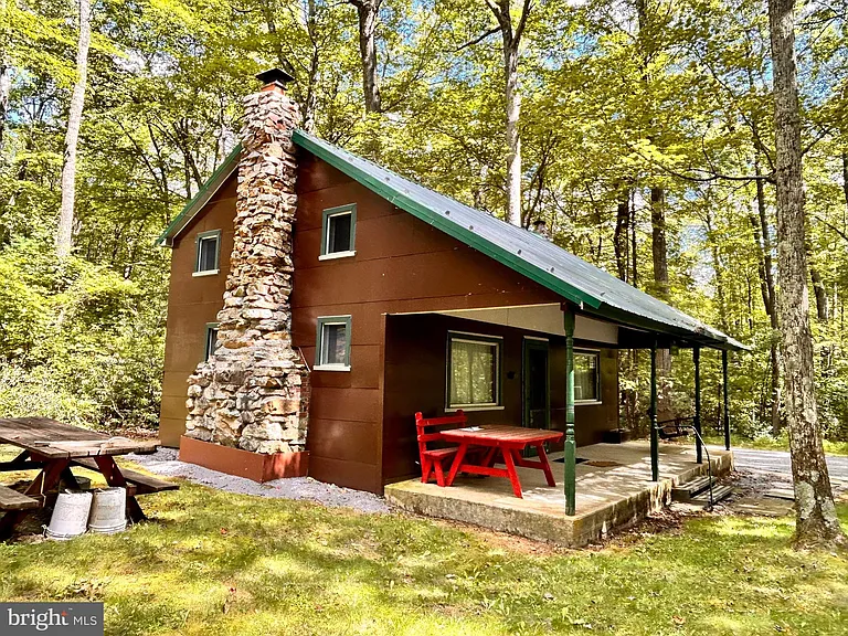 Perfect getaway located on leased land in Rothrock State Forest. $99,000