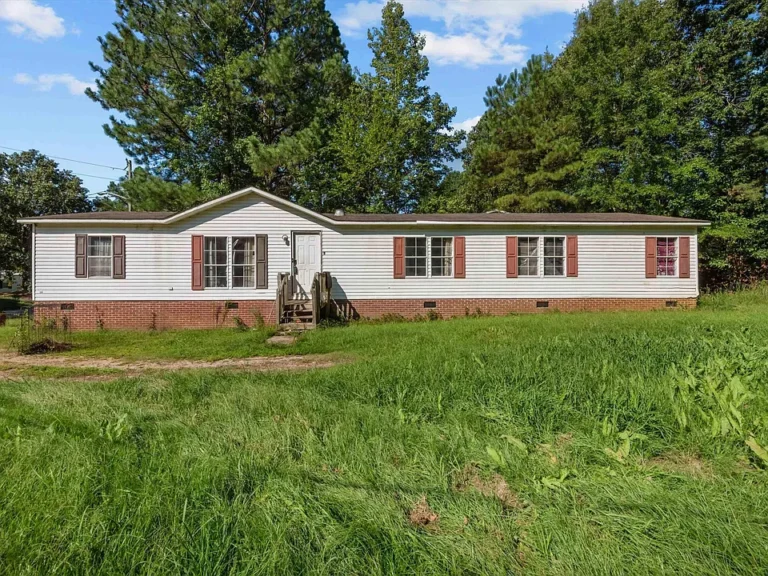 4-Bedroom, 2-Bath Home with Multiple Living Spaces $74,900