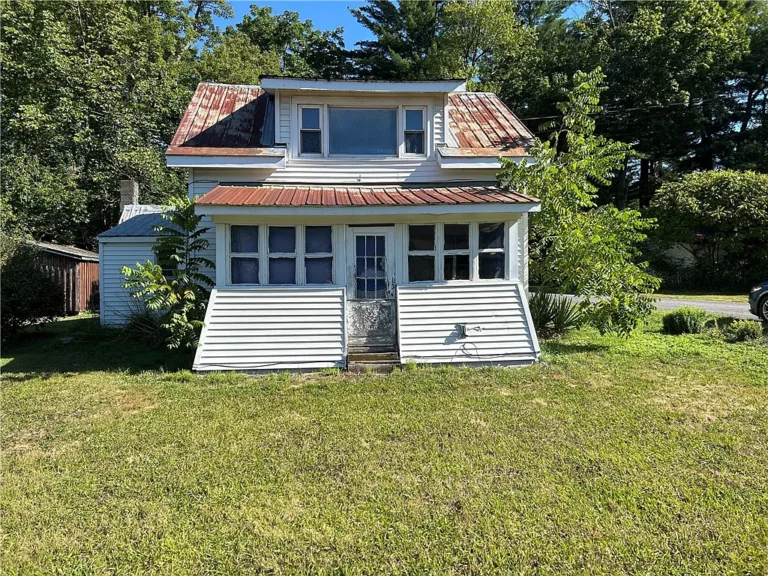 This corner lot is located in a quiet and charming lake community