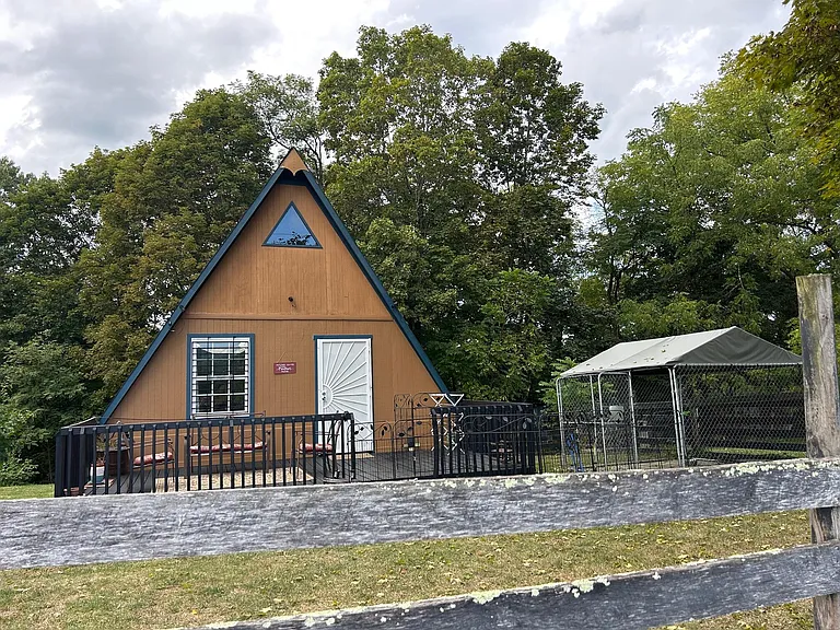 frame. Spectacular farm and mountain views, $99,000