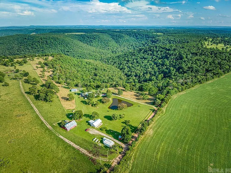 Don’t miss this rare opportunity to own an extraordinary Ozark Mountain estate in Berryville, AR