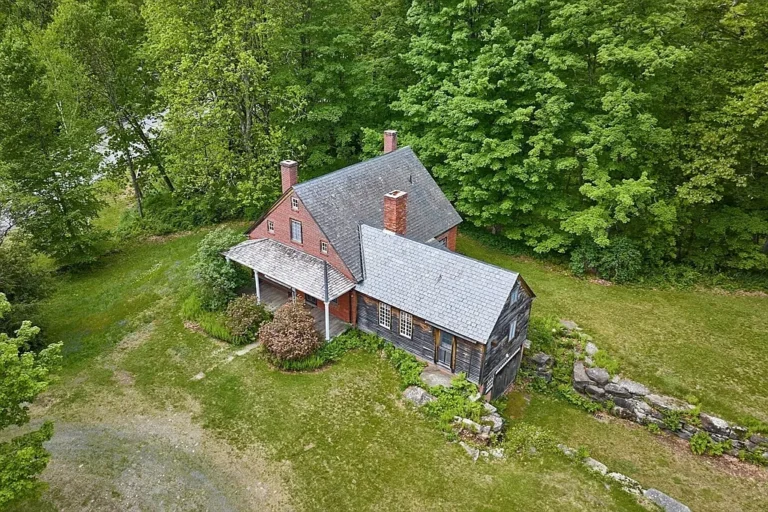 Historic Brick Cottage with Expansive Barn Complex on 20± Scenic Acres