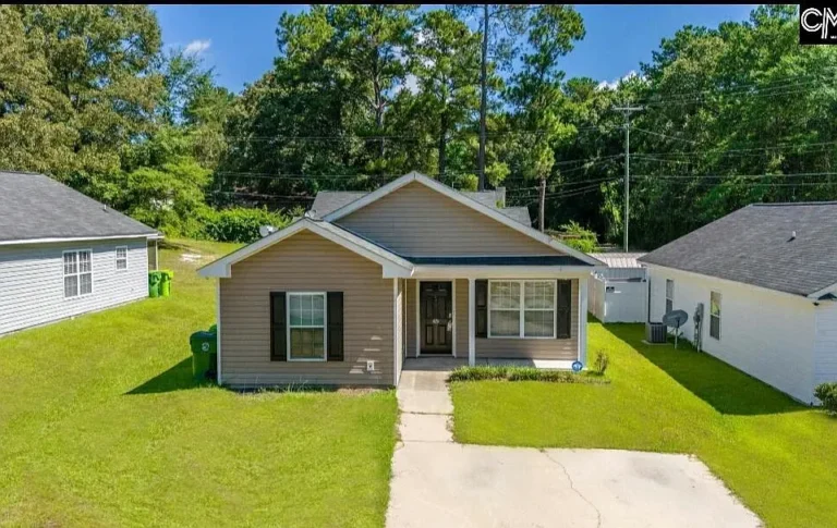 3 Bedrooms • 2 Bathrooms • Vaulted Ceilings • Open Floor Plan • Enclosed Porch