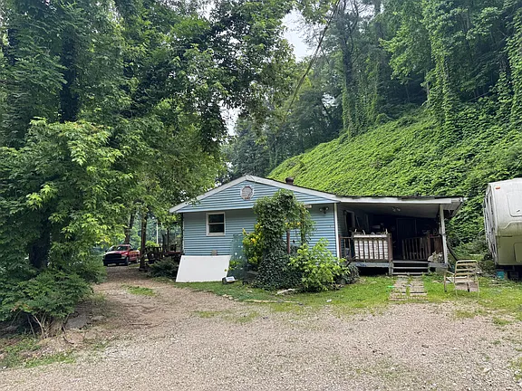 Expansive Eastern Kentucky Property with Old Homeplace, Stocked Pond & Prime Hunting Land