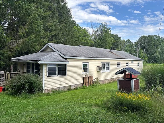 A Peaceful Half-Acre Retreat with Garage, Utilities & Unlimited Potential in Nichols, NY