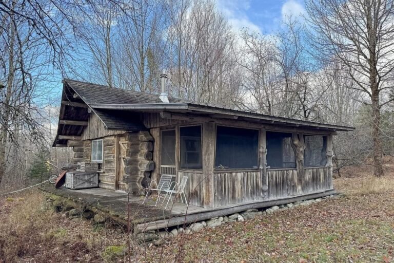 Log Cabin Retreat on 128 Acres in Carroll Plantation