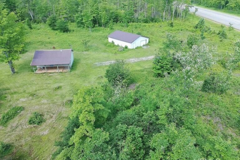 Home with 80.03 Acres in Gulliver, Michigan