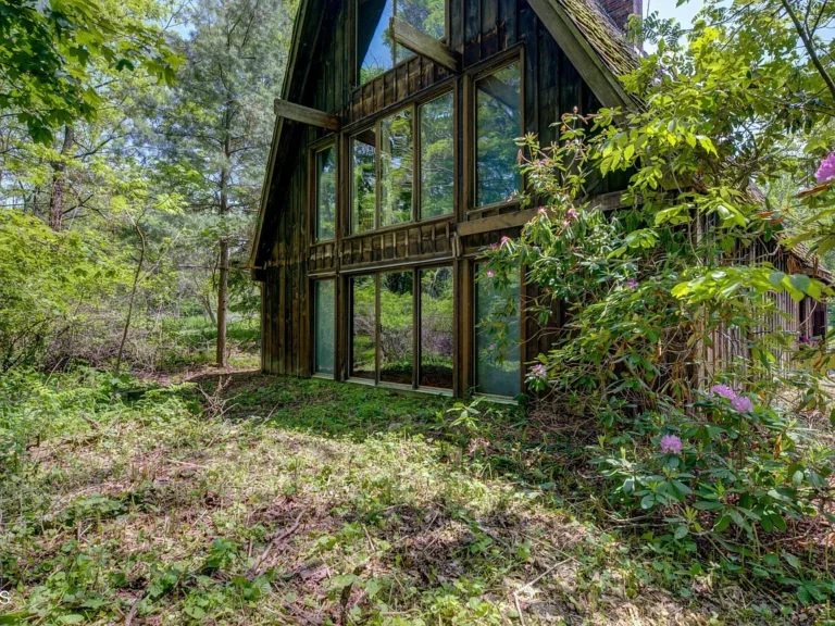 Experience Storybook Living in a Modern 3-Story Home on 11.42 Private Acres