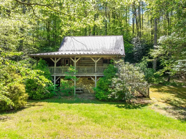 A Timeless Mountain Treasure: Immaculate Antique Log Cabin on 3.86 Acres in Altamont Acres