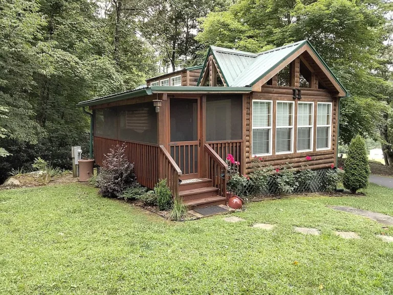 Charming Tiny Home Retreat in a Peaceful 55+ Community — Streamside Living at Its Best $136,500