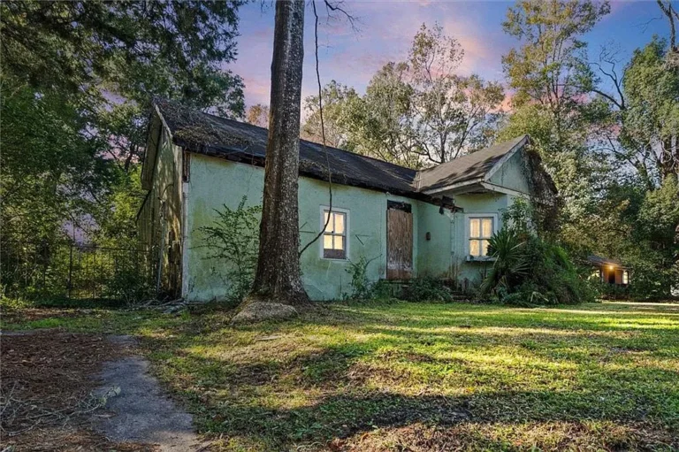 Investor Special on Nearly One Acre – Sold As-Is