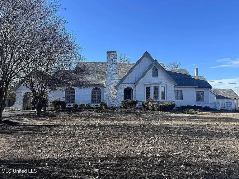 Elegant Historic Brick Home with Resort-Style Backyard in Ruleville