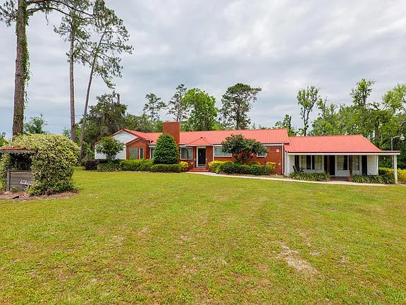 Vintage Brick Ranch on 2+ Acres with Private Creek & Dock
