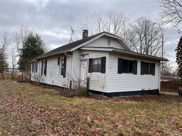 Charming 2-Bedroom Fixer-Upper on Nearly Half an Acre In-Town
